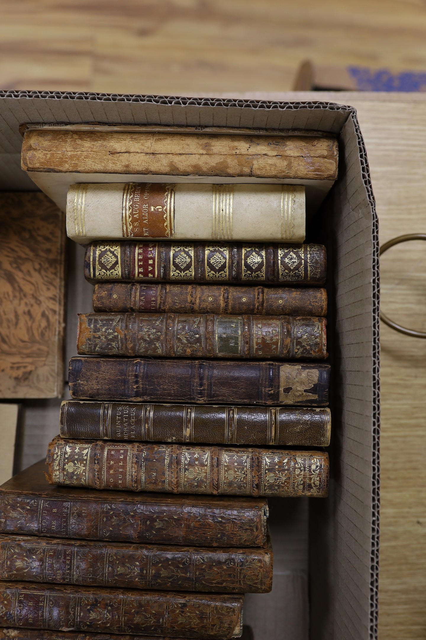 A selection of 18th and 19th century leather bound books